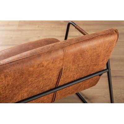 elegancki brązowy fotel w stylu retro 