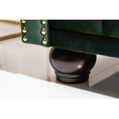 Welurowa zielona sofa w stylu Chesterfield
