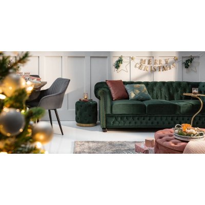 Welurowa zielona sofa w stylu Chesterfield
