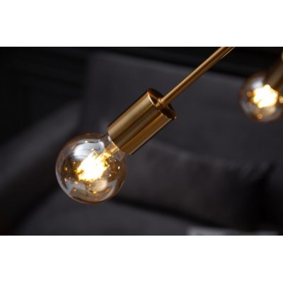 Złota lampa wisząca do salonu
