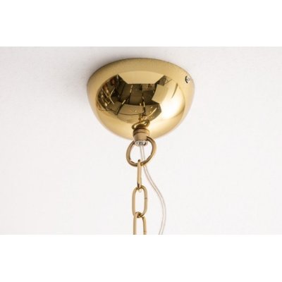 Złota lampa wisząca do salonu