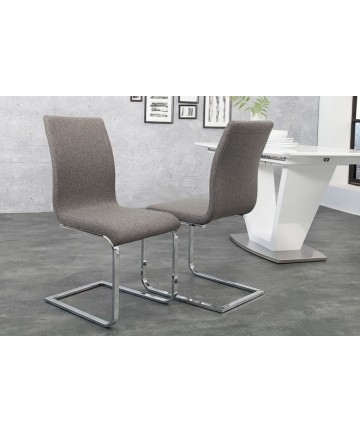 szare krzesło na płozach z tkaniny doda odrobinę elegancji Twojemu pomieszczeniu 