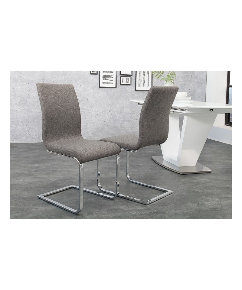 szare krzesło na płozach z tkaniny doda odrobinę elegancji Twojemu pomieszczeniu 
