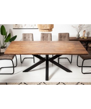 Duży drewniany stół z czarnymi nogami