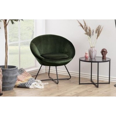 nowoczesny fotel do salonu w modnej zielonej butelce z velvetu